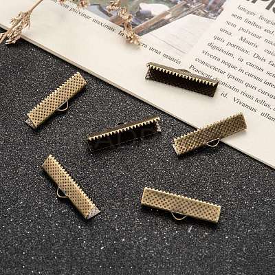 Iron Ribbon Crimp Ends E182Y-NFAB-1